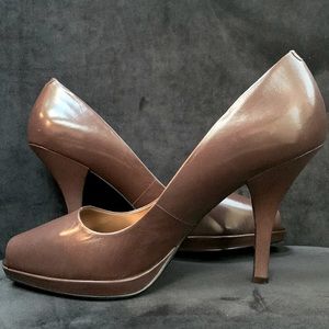 New, Women’s size 8 chocolate brown peep toe 4-inch heel.